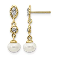 Pair of gold drop earrings with twisted rope-textured oval tops set with diamonds, connected by chain links to pearl drops below, shown from front and side views.