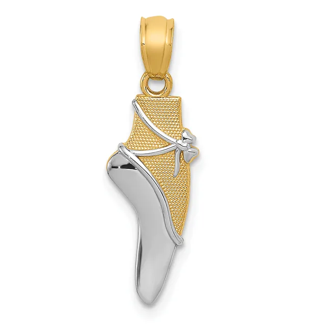 A two-tone gold and silver ballet pointe shoe pendant with textured yellow gold upper and polished white metal sole, suspended from a yellow gold bail.