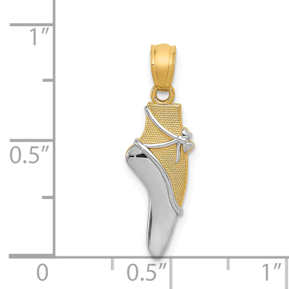 Two-tone gold and silver ballet pointe shoe pendant with textured gold upper and polished silver sole, shown next to a measurement scale indicating approximately 0.75 inches in height.