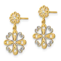 Pair of gold drop earrings with ornate floral studs and dangling filigree flower designs accented with small diamonds.