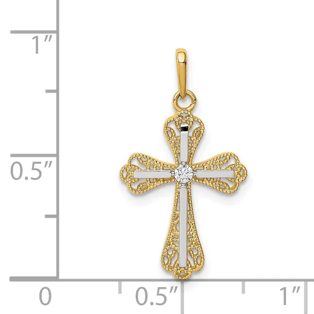 A two-tone cross pendant with textured gold filigree lobes and a polished white gold center, displayed against a ruler showing approximately one inch in height.