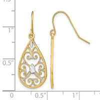 Two gold teardrop earrings with ornate filigree scrollwork and a clear crystal stone in the center, displayed next to a measurement ruler.