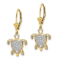 A pair of two-tone gold leverback earrings featuring ornate turtle charms with filigree detailing and diamond accents.