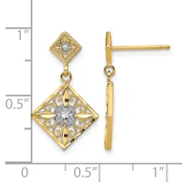 A pair of two-tiered diamond dangle earrings in yellow gold with filigree detailing, shown front and side view against a measurement scale.