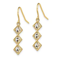 A pair of gold drop earrings with curved ear wires, each featuring three connected diamond-shaped frames with faceted silver-toned stones inside.
