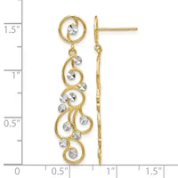 Pair of gold-tone dangle earrings with scrolled designs accented by faceted silver-tone stones, displayed against a measurement scale showing approximately 1.5 inches in length.