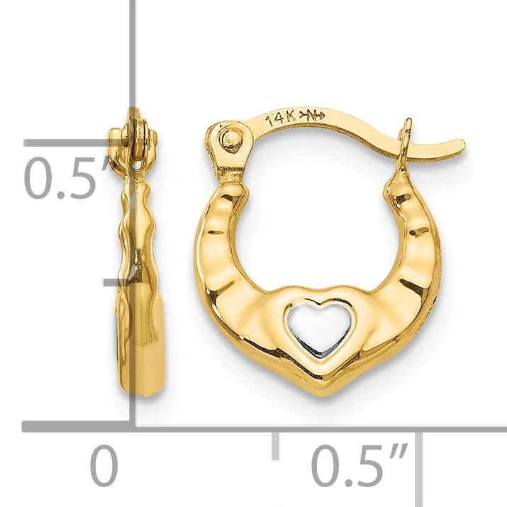 Pair of gold hoop earrings with heart cutout detail and measurement scale showing approximately 0.5 inches in diameter.