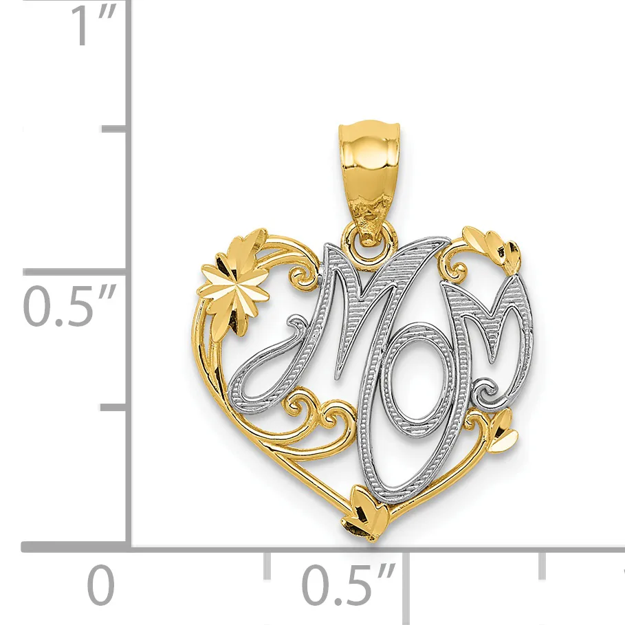 Two-tone gold heart pendant with "Mom" in script surrounded by decorative scrolls and floral elements, shown next to a ruler measuring approximately one inch tall.