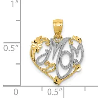 Two-tone gold heart pendant with "Mom" in script surrounded by decorative scrolls and floral elements, shown next to a ruler measuring approximately one inch tall.