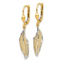 Pair of two-tone gold lever-back earrings with feather-shaped pendants featuring textured yellow gold centers and white gold edges.