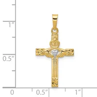 Gold cross pendant with claddagh heart design at center, shown against a measurement scale indicating approximately one inch in height.
