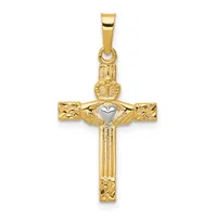 Gold cross pendant with textured arms, vertical ridged shaft, a small white heart at the center, and a crown with small hallmark at the top.