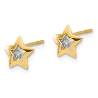 A pair of gold star stud earrings with white diamond-cut centers and gold posts.