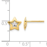 A pair of gold star-shaped stud earrings with white enamel centers, shown front and side view against a measurement scale.