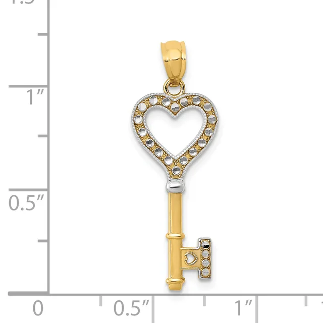 Gold heart-shaped key pendant with crystal embellishments, shown next to a measurement scale indicating approximately one and one-quarter inches in length.