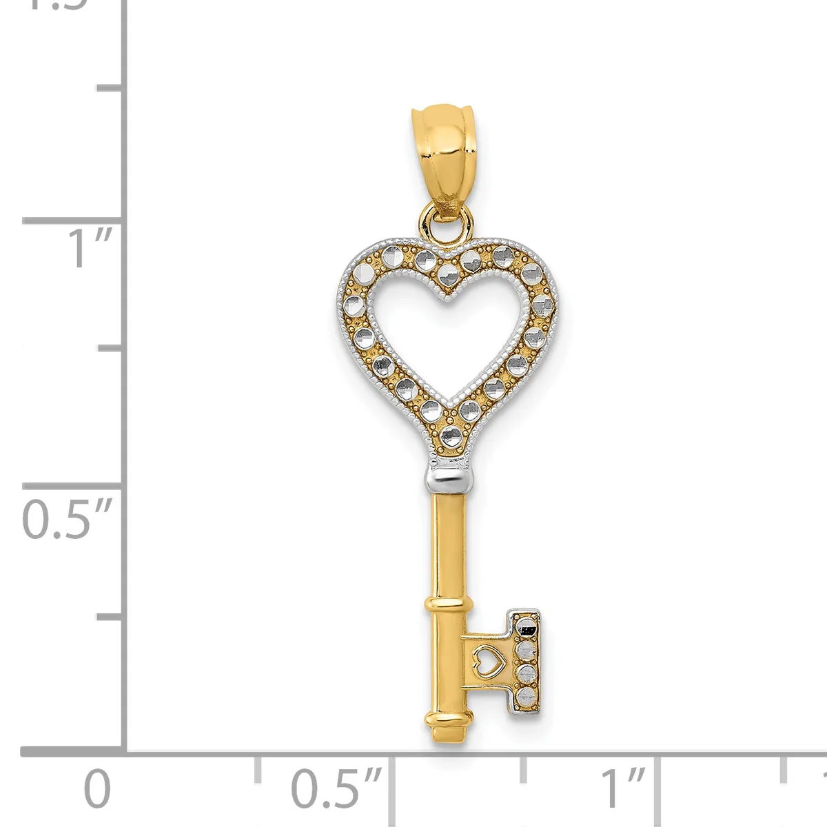 Gold heart-shaped key pendant with crystal embellishments, shown next to a measurement scale indicating approximately one and one-quarter inches in length.
