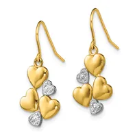 Pair of gold heart-shaped dangle earrings with diamond-accented heart charms, displayed on a white background.