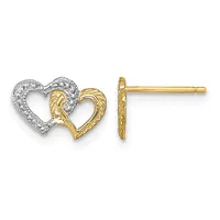 Pair of two-tone gold stud earrings featuring interlocking heart outlines, one with a textured finish and one with a diamond-patterned surface.