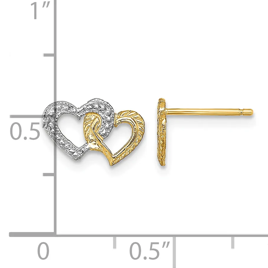 Two interlocking hearts in white and yellow gold with textured surfaces, shown next to a ruler indicating approximately half an inch in height.