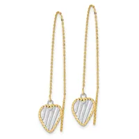 Pair of gold and silver two-tone heart-shaped threader earrings with textured centers and delicate chain strands.
