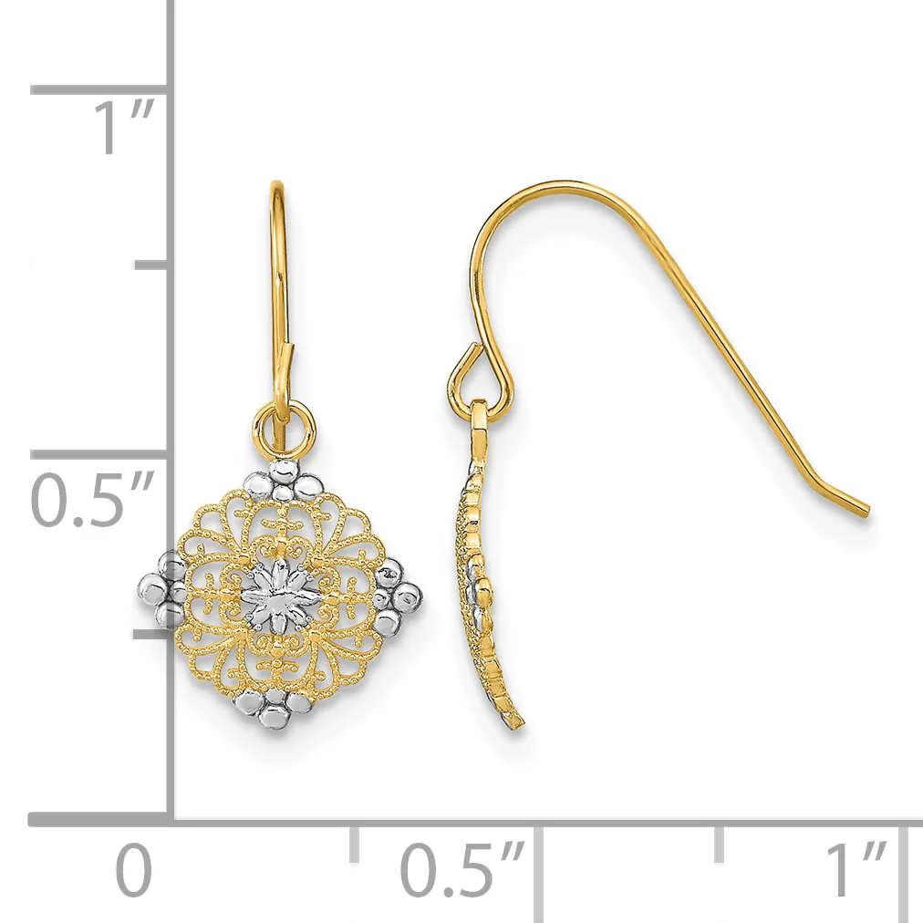 Pair of gold filigree flower dangle earrings with white metal centers and curved ear wires, shown against a ruler measuring approximately 0.75 inches in length.