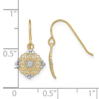 Pair of gold filigree flower dangle earrings with white metal centers and curved ear wires, shown against a ruler measuring approximately 0.75 inches in length.