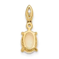 Gold pendant featuring an oval cream-colored cabochon stone set in an ornate frame with decorative side details and a small diamond accent on the bail.