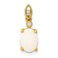 Gold pendant with an oval white opal stone suspended from an ornate bail set with two round white diamonds.