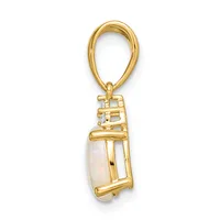 Gold pendant with oval loop bail suspending a rectangular setting that holds a white opal stone wrapped in polished gold metalwork.