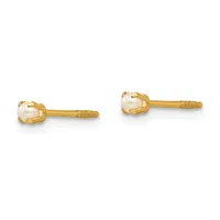 A pair of gold stud earrings with white oval stones in prong settings and textured post backs, shown from the front.