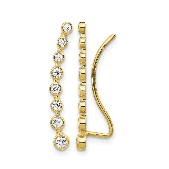 A pair of gold ear crawlers featuring a linear strand of bezel-set round diamonds on the left and a polished curved hook on the right.