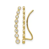A pair of gold ear crawlers featuring a linear strand of bezel-set round diamonds on the left and a polished curved hook on the right.