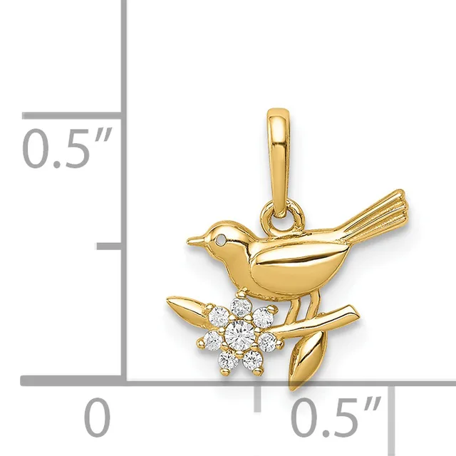 Gold bird pendant on branch with diamond cluster flower, shown next to ruler indicating approximately half inch height.