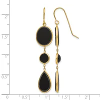 Gold-toned drop earrings with black onyx stones in oval and teardrop shapes, shown on a measurement scale.