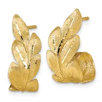 Pair of gold-toned leaf-shaped stud earrings with textured surfaces and post backs, shown from front and side angles.