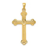 A gold cross pendant with ornate curved ends and a diamond-shaped center detail, suspended from a gold bail.