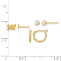 Three pairs of gold earrings displayed on a measurement scale: small bow stud earrings, small hoop earrings, and pearl stud earrings in neutral tones.