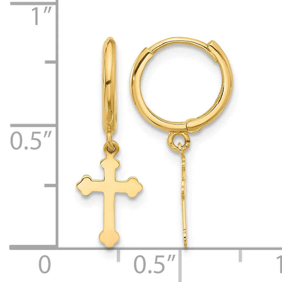 Pair of gold-toned hoop earrings with dangling cross charms, shown next to a measurement scale indicating approximately one inch in length.