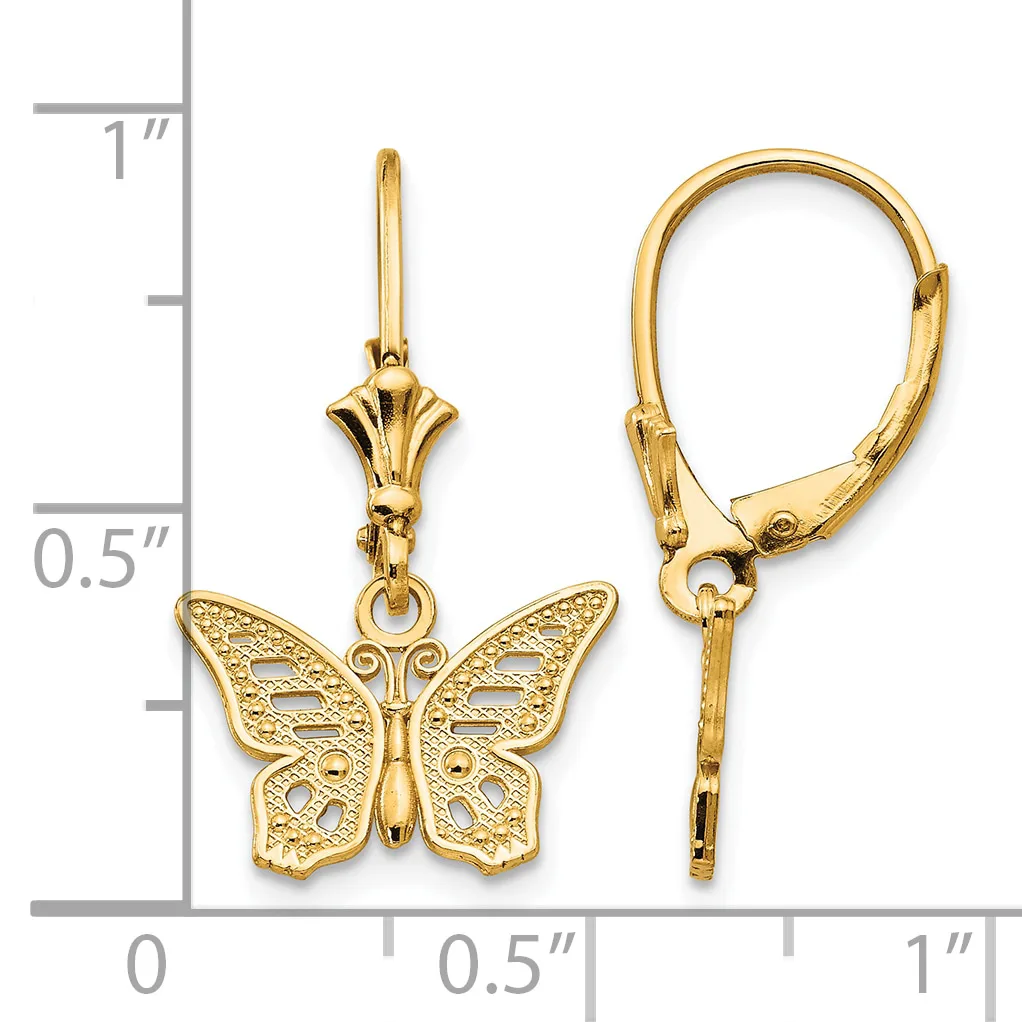 Gold butterfly dangle earrings with textured wings shown next to a ruler displaying the earrings are approximately one inch long.