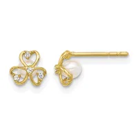 Pair of gold stud earrings with three-lobed cloverleaf designs accented with small diamonds, shown from front and side views.