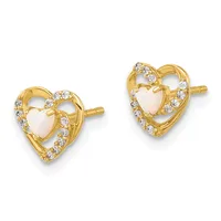 A pair of gold heart-shaped stud earrings with opal centers surrounded by white gemstone accents.
