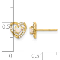 Gold heart stud earrings with opal centers surrounded by small diamonds, shown with a ruler indicating approximately 0.5 inches in size.