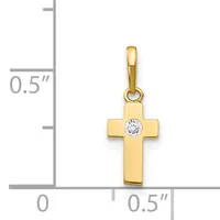 A gold cross pendant with a round diamond or cubic zirconia stone at its center, shown next to a measurement scale indicating approximately 0.5 inches in height.