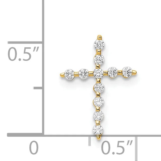 A gold cross pendant with round diamond stones arranged in a cross pattern, shown next to a ruler indicating the pendant is approximately half an inch wide and tall.