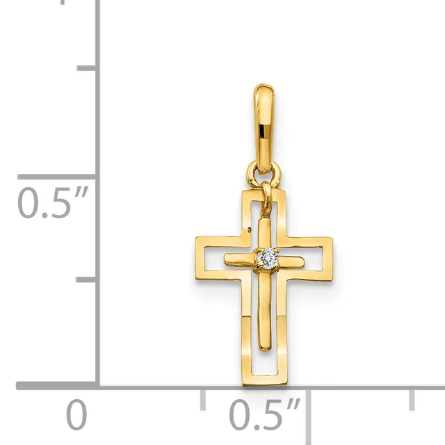 Gold cross pendant with a diamond at the center, shown next to a ruler indicating it is approximately one-half inch in width and height.
