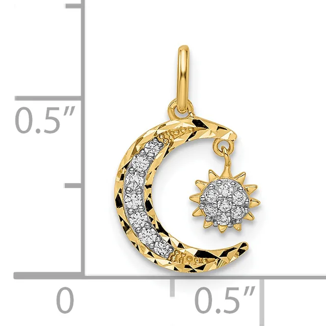 Gold moon and sun charm pendant with diamond pavé settings, shown next to a ruler indicating 0.5 inches in height.
