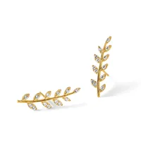 Gold leaf-shaped earrings with diamond pavé settings, shown as a pair with one horizontal branch design and one vertical design.