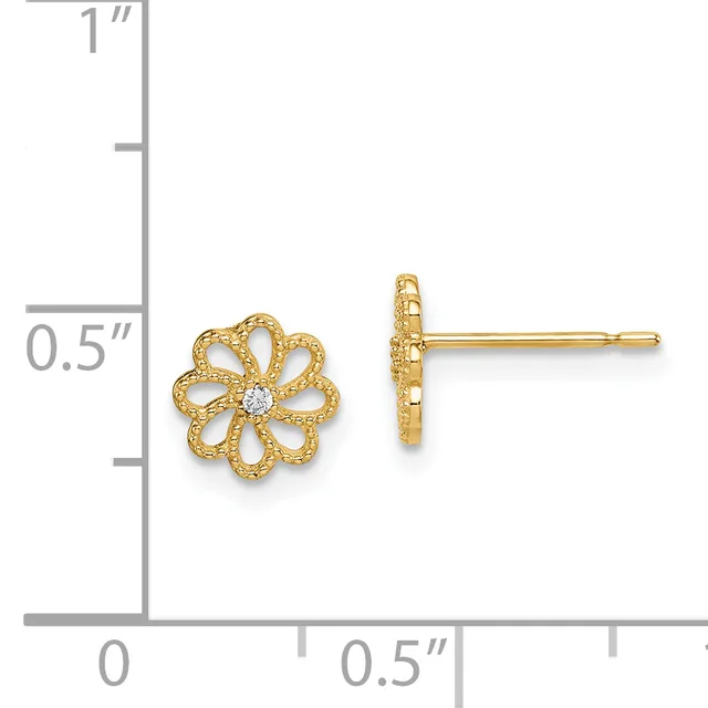 Gold flower stud earrings with textured petals and a small round diamond in the center, shown against a measurement scale.
