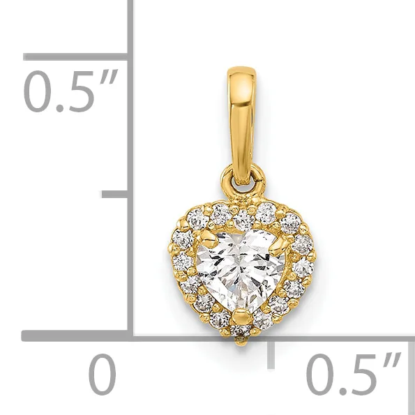 Gold heart-shaped pendant with a faceted clear cubic zirconia center surrounded by smaller cubic zirconia stones, shown next to a measurement scale indicating approximately 0.5 inches in height.