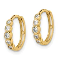 Pair of gold hoop earrings with bezel-set round diamonds arranged along the outer edges, shown against a white background.